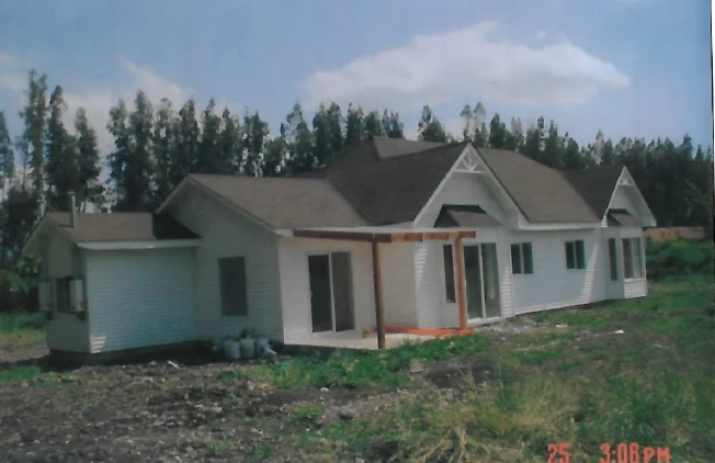 Casa americana estructurada en madera Calera de Tango